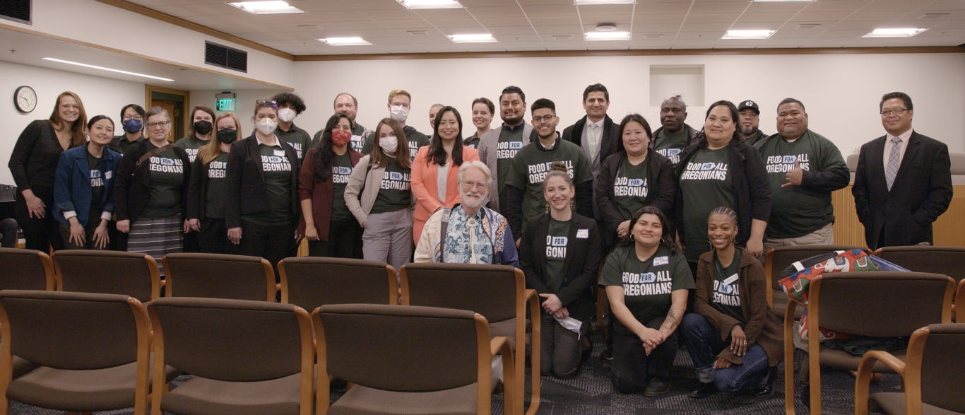 Community members and partner organizations gathered at the Oregon State Capitol to urge lawmakers to protect food access for all.